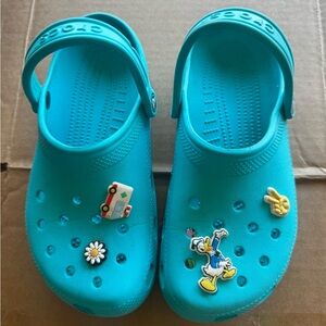CROCS Teal Slip-On Clogs with Cartoon Charms